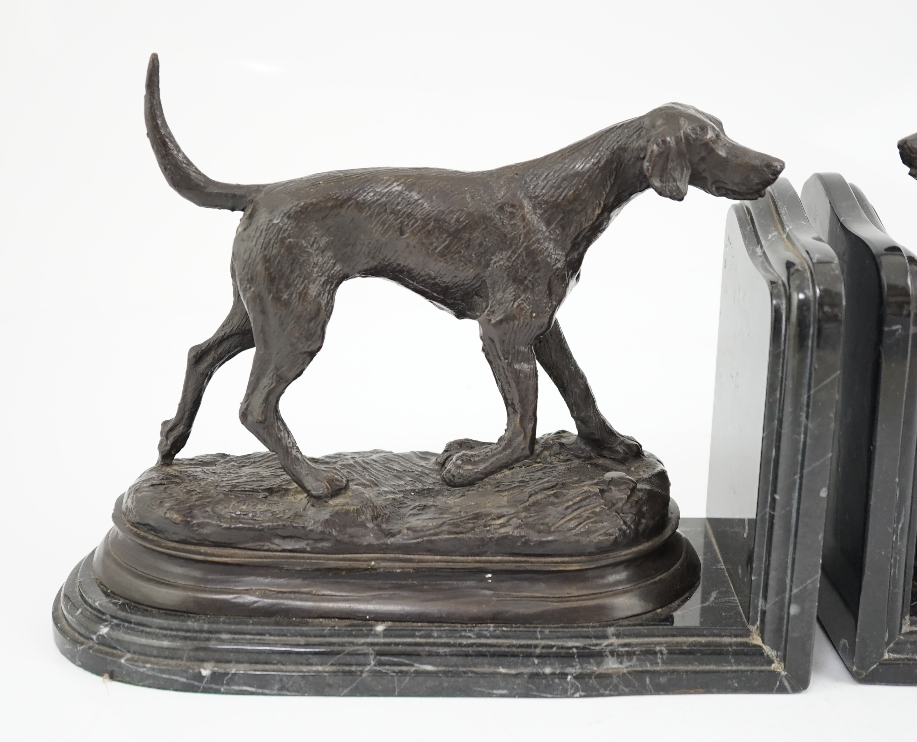 After Pierre-Jules Mêne (1810-1879), a pair of bronze models of hunting hounds
